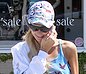 While talking on phone Paris Hilton shows her cameltoe